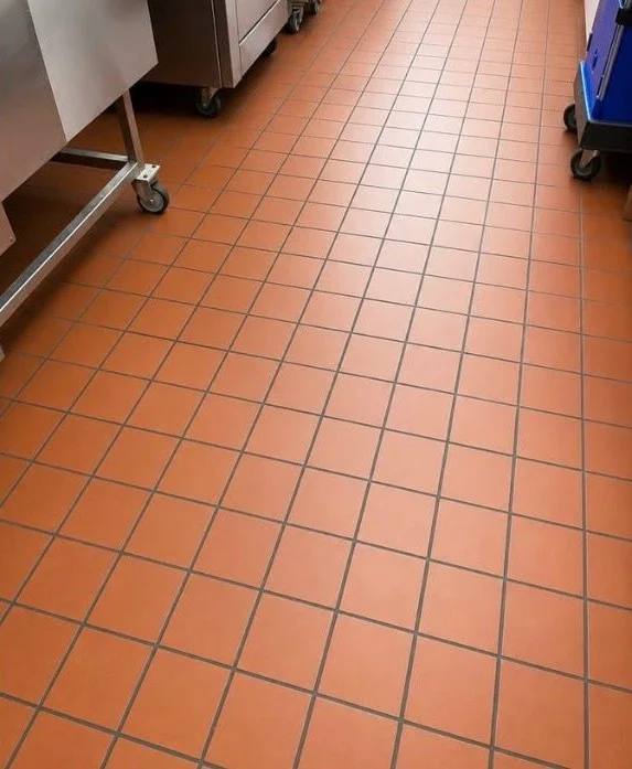 Bright, streak-free commercial kitchen tile floor after a cleaning in Tampa, FL
