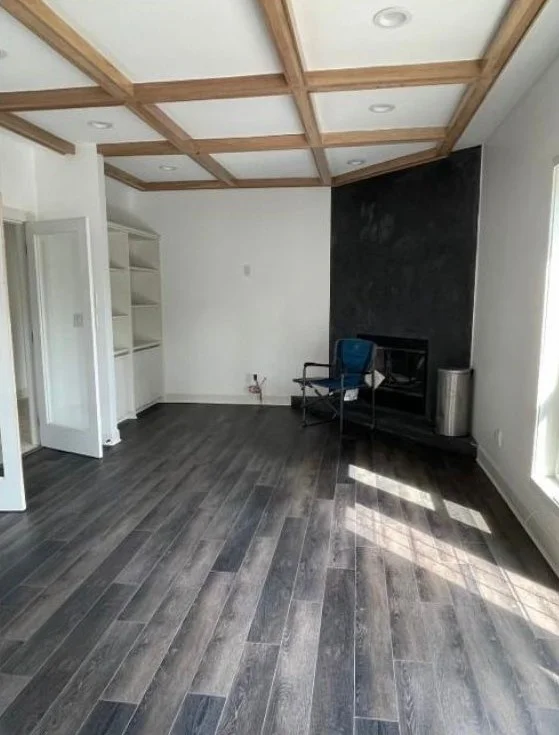 Same living room spotless and move-in ready after a post-construction cleaning in Tampa, FL