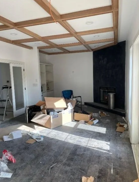 Living room full of construction debris and dust before a post-construction cleaning in Tampa, FL