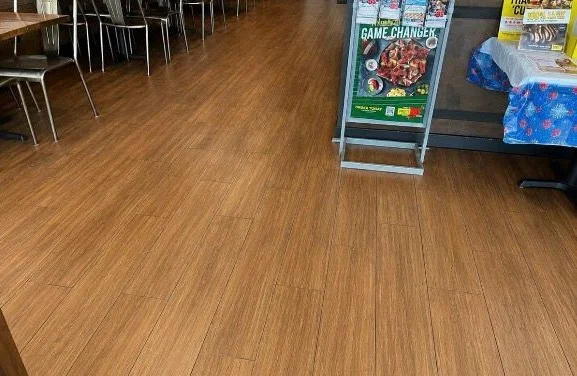 Clean, restored restaurant dining room floor after a commercial cleaning in Tampa, FL