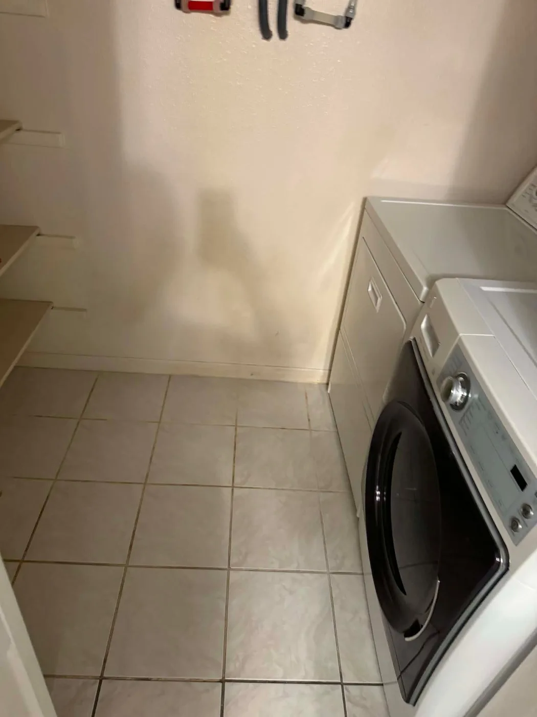 Clean laundry room tile floor in a Tampa, FL home