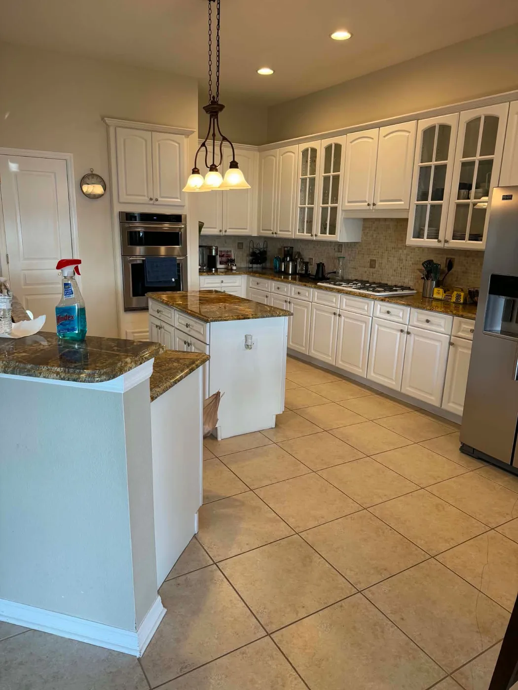 Kitchen counter being cleaned with multi-purpose cleaner in a Tampa, FL home